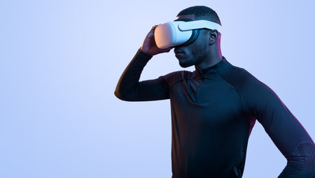 Determined black man in VR headset