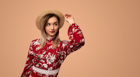 Stylish woman in floral dressの写真素材