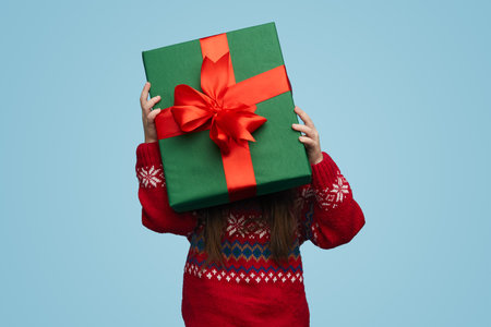 Woman with gift boxの写真素材