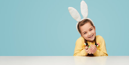 Cute girl with easter eggの写真素材