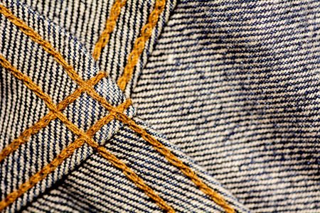 The stitching on the inside of the jeans.