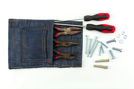 The tool is in the pocket, the drill in the pocket.の写真素材