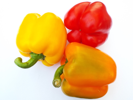 Sweet peppers - red, yellow, orangeの写真素材