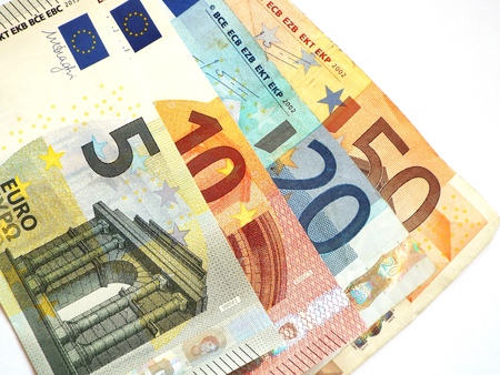 Euro banknotes:  Some small euro banknotes are spread.の写真素材