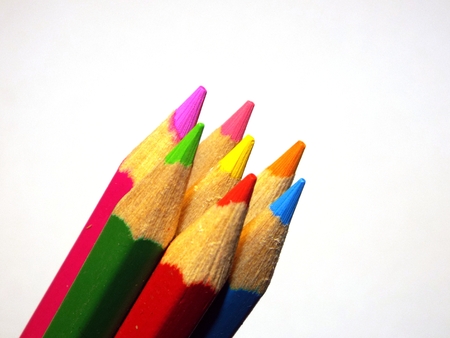 Colored pencils. Crayon tips project diagonally from the left in the picture.の写真素材