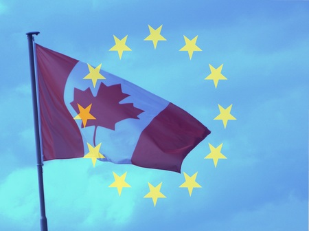 CETA - the Comprehensive Economic and Trade Agreement - Canadian flag behind the transparent Europe...