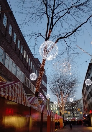 Christmas Market - Christmas decorated with street stalls on the Christmas market at dusk, Germany, Essen 10.12.2015のeditorial素材