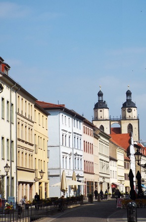 Towers of St. Mary's Church. View from the Castle Street. Wittenberg, Germany 04.12.2016 - At the door of the Castle Church in Wittenberg reformer Martin Luther nailed his 95 theses. By Luther and Melanchthon, the Wittenberg wurde the center of the Reformのeditorial素材