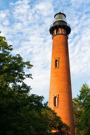 The Currituck Beach Lighthouse in Carolla, North Carolina was left unpainted revelinag thousands of red clay bricks の写真素材