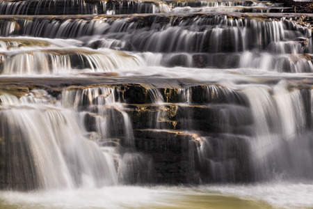 Whitewater of an unnamed creek cascades over Little Sister Falls in Indianaの写真素材