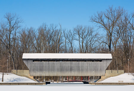 The New Brownsville Covered Bridge, seen here blanketed in winter snow, was built in 1840, was relocated to Columbus, Indiana in 1986.のeditorial素材