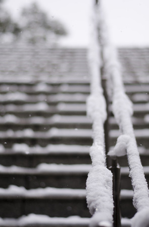 stairway in winter and snowの写真素材