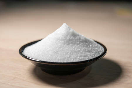 Heaps of white salt on a plate