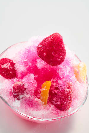 Shaved ice with lots of delicious syrup when eaten in hot summerの写真素材