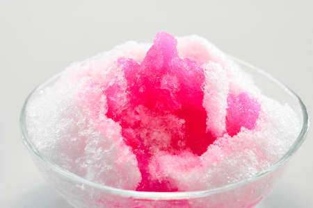 Shaved ice with lots of delicious syrup when eaten in hot summerの写真素材