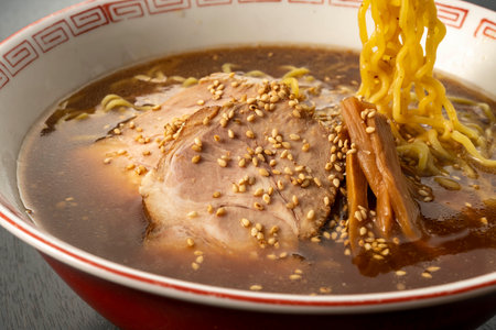 Japanese miso ramen noodle soup with pork in a bowlの写真素材