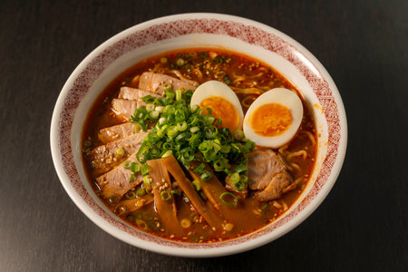 Japanese ramen noodle with pork and egg on wooden background.の写真素材