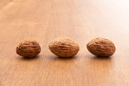Nuts on a wooden background. Close-up shot.