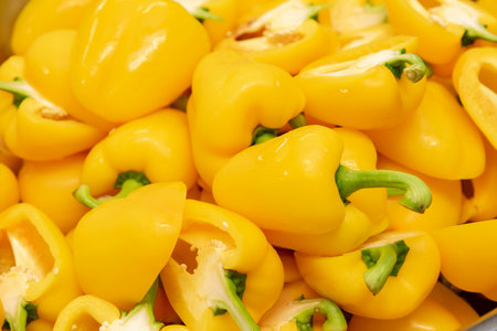 Close up of yellow peppers in a bowl, shallow depth of fieldの写真素材