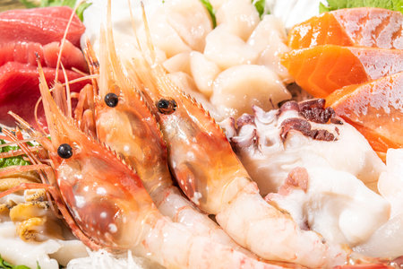 Seafood sashimi platter with salmon and prawnsの写真素材