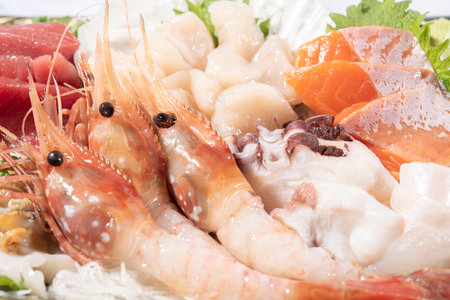 Seafood sashimi platter on white background, close upの写真素材
