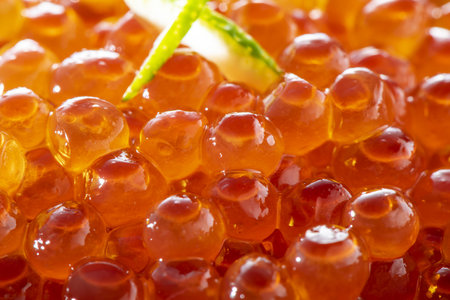 Red caviar close-up macro photo. Seafood background.の写真素材