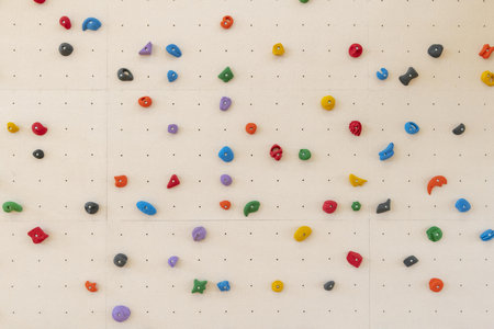 Multicolored climbing wall background, top view, copy space.の写真素材