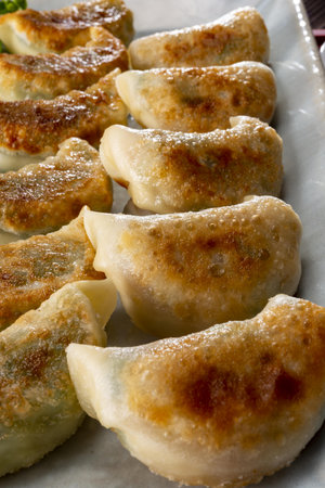 Fried dumplings on a plate. Selective focus.の写真素材