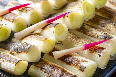 Bamboo shoots on a cutting board, close-up, selective focus.の写真素材