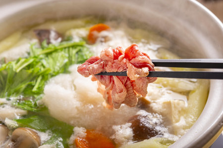 chinese noodle soup with pork and vegetables, close-upの写真素材