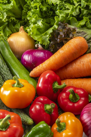 Close up of fresh vegetables on wooden table. Healthy food background.の写真素材