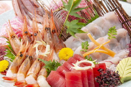 Japanese cuisine, sashimi platter with prawns and tunaの写真素材