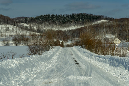 Winter road in the mountains. Winter road in the mountains. Winter roadの写真素材