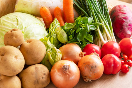 Fresh vegetables on wooden background. Healthy food concept. Close up.の写真素材