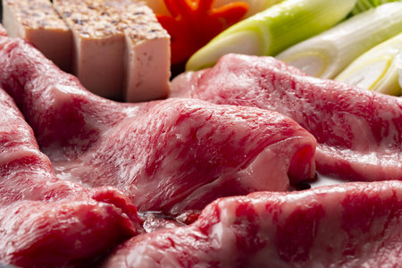 Raw beef and vegetables for Sukiyaki japanese foodの写真素材