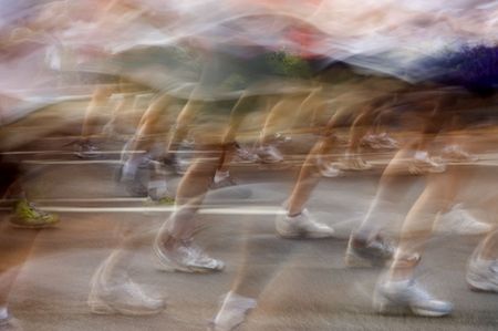 Blurred runners at the Peachtree Road Raceの写真素材