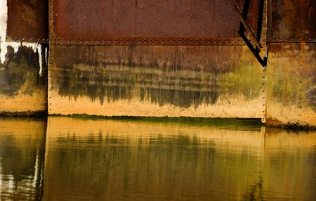 Rusted bridge support on the Chattahoochee riverの写真素材
