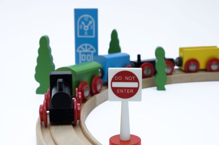wooden toy train set with a Do Not Enter signの写真素材