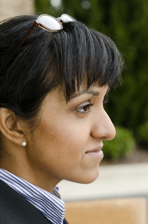 Young business woman looking out over a job siteの写真素材