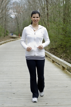 Attractive and fit woman having a jog の写真素材