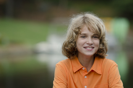 Handsome youg man smiling for the cameraの写真素材