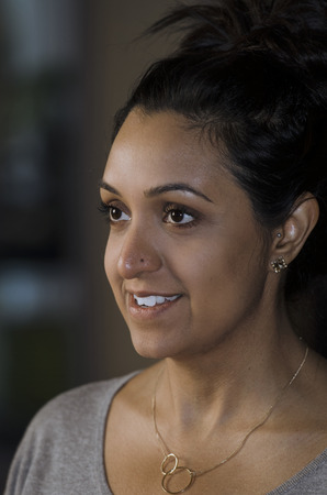 Happy attractive Indian woman shown close upの写真素材