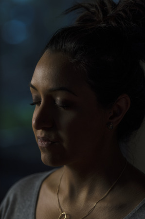 Beautiful Indian woman is quiet and meditatingの写真素材