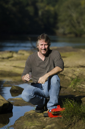 biologist is happy with the results of his testの写真素材