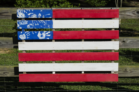 Painted fense section colored like the American Flagの写真素材