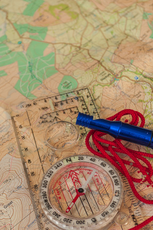 Compass on Map and Rescue Whistle の写真素材