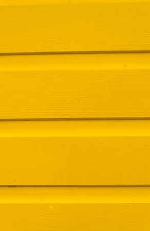 Yellow Painted Wooden Backgroundの写真素材