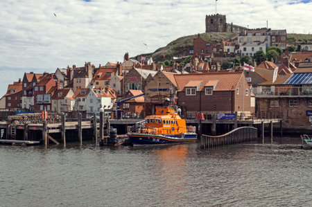 Whitby,England - July 13, 2016: The Whitby R.N.L.I. Lifeboat at its mooring in Whitby harbour on the North Yorkshire coastのeditorial素材