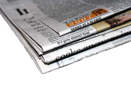 Pile of newspaper on white background