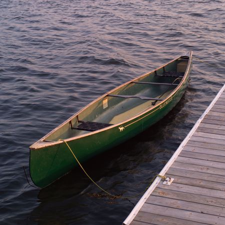 Lake of the Woods Ontario Canada,Canoe tied up to dockの写真素材